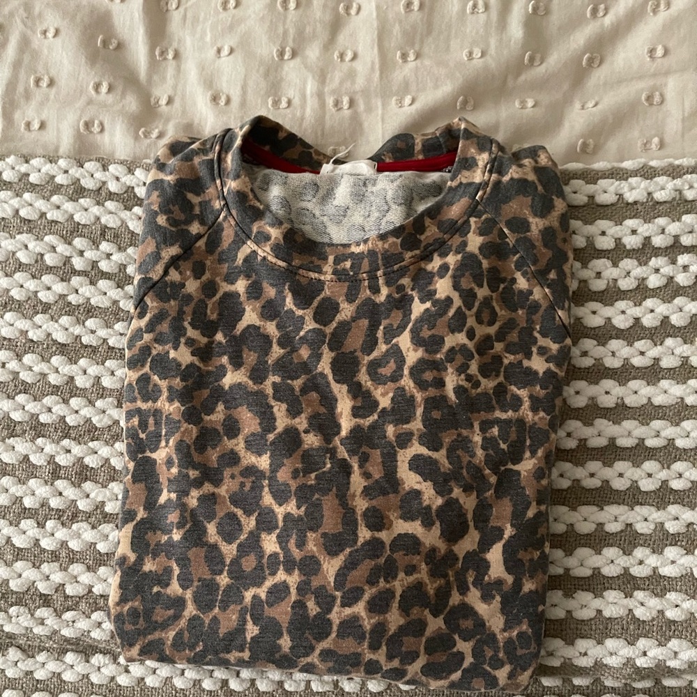 Top on the crop side .cheetah print size small
